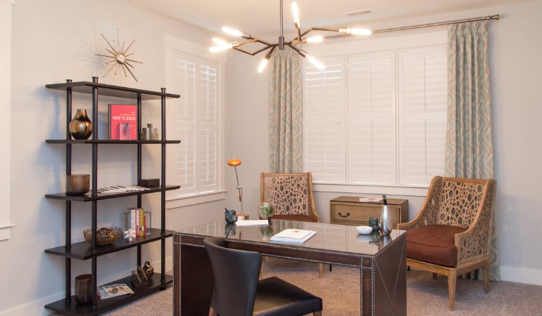 Charlotte home office with plantation shutters.